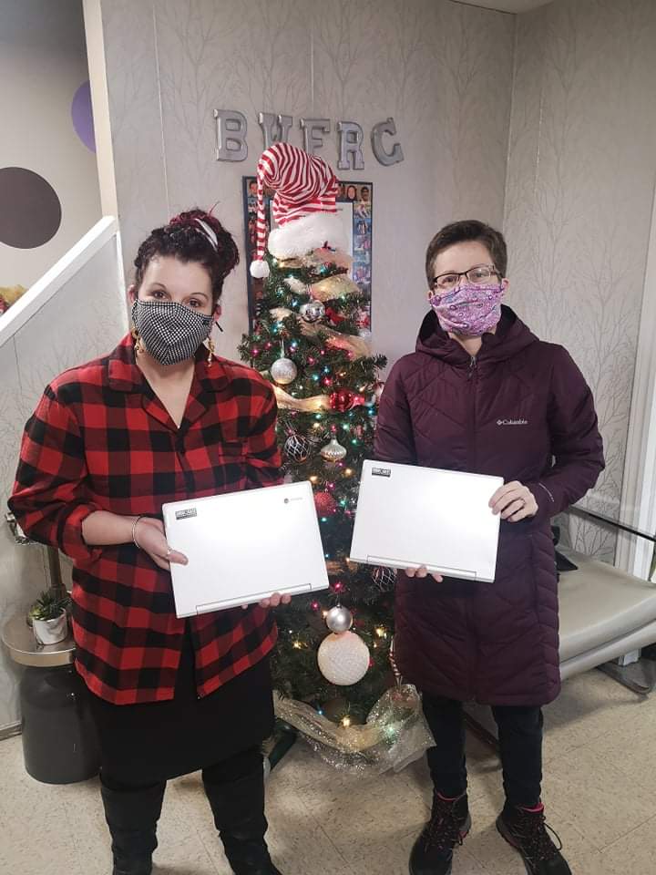 Exex. director Donna Sutton with Surrogate Chromebooks